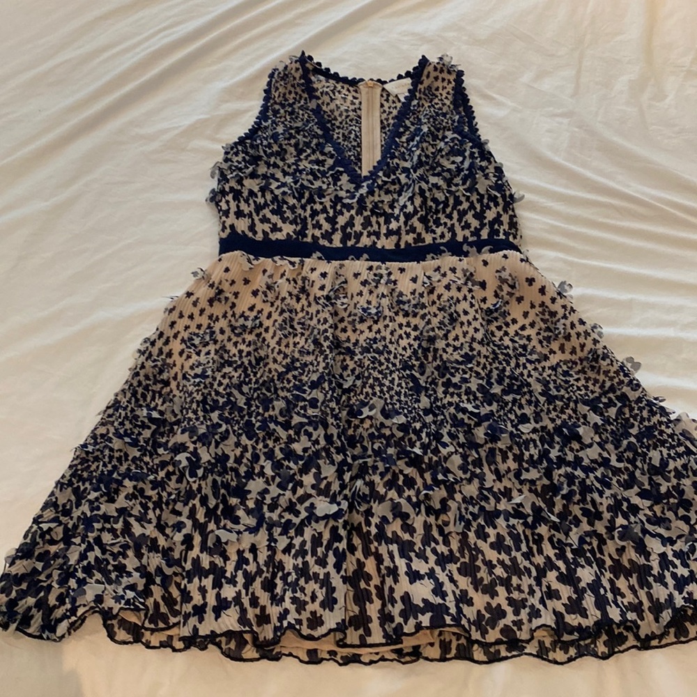 Pale pink (almost beige) and navy fit and flare v neck dress